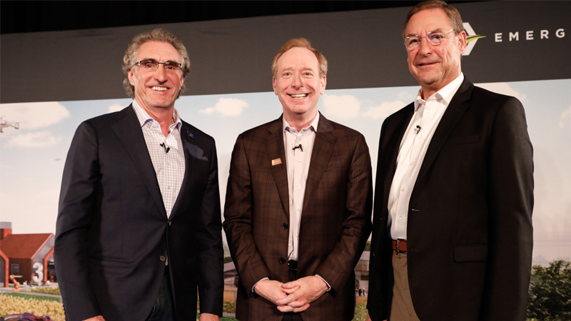 Doug Burgum, Brad Smith, and Barry Batcheller standing together