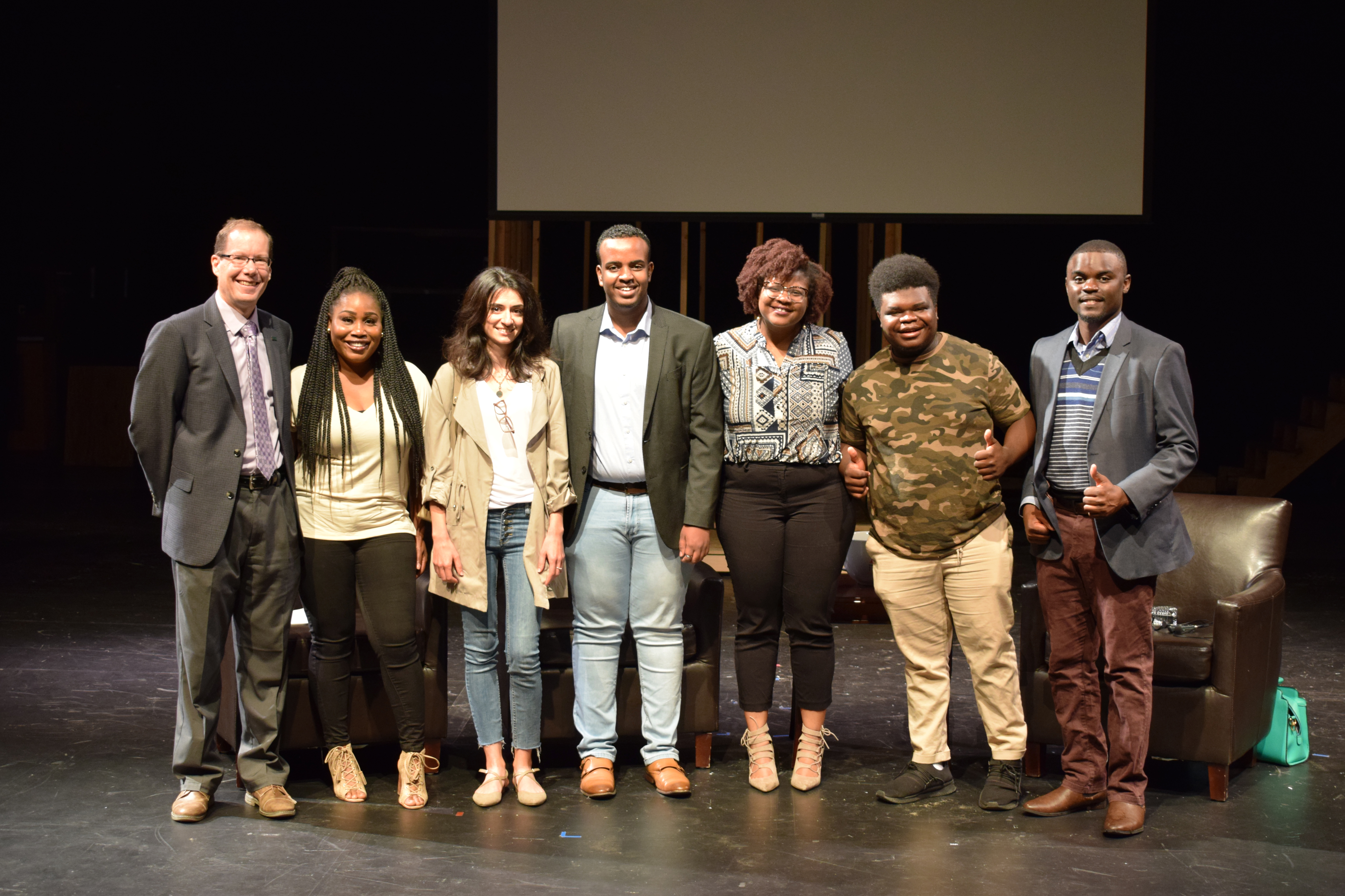 Six of the New American Entrepreneur Program Cohorts pose with the Director of the Challey Institute, John Bitzan.